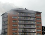 Причиной пожара в десятиэтажке стало неосторожное обращение с огнем