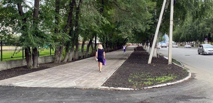 Завершен ремонт тротуара по проспекту Коммунистическому