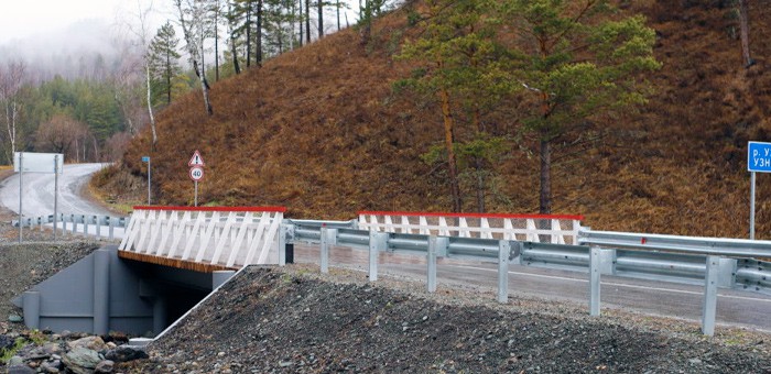 Завершен ремонт моста через реку Узнезя