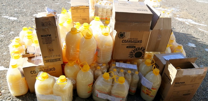 Алтайские таможенники передали в интернат сотни литров изъятого масла